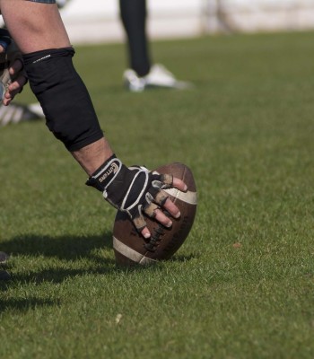 A federal judge has sided with Washington State over its firing of a football coach who refused vaccination based on religious grounds.