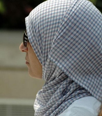 A muslim woman wearing a hijab.