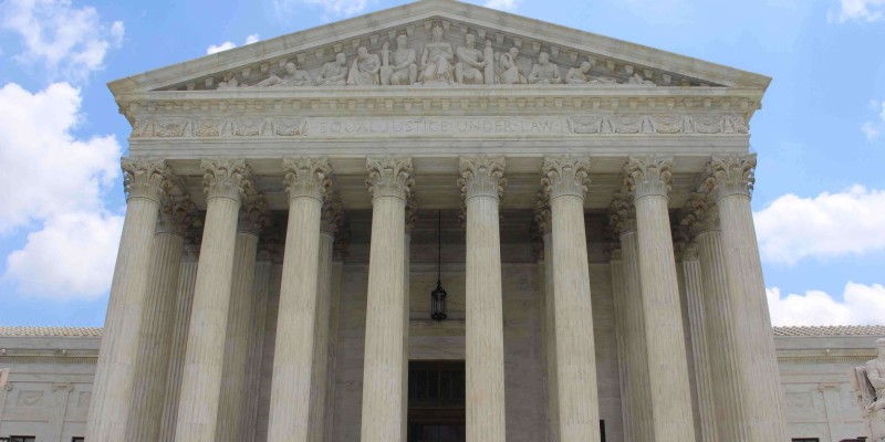 A picture of the building housing the Supreme Court of the U.S.