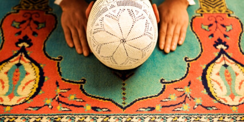 Muslim praying in Islamic fashion