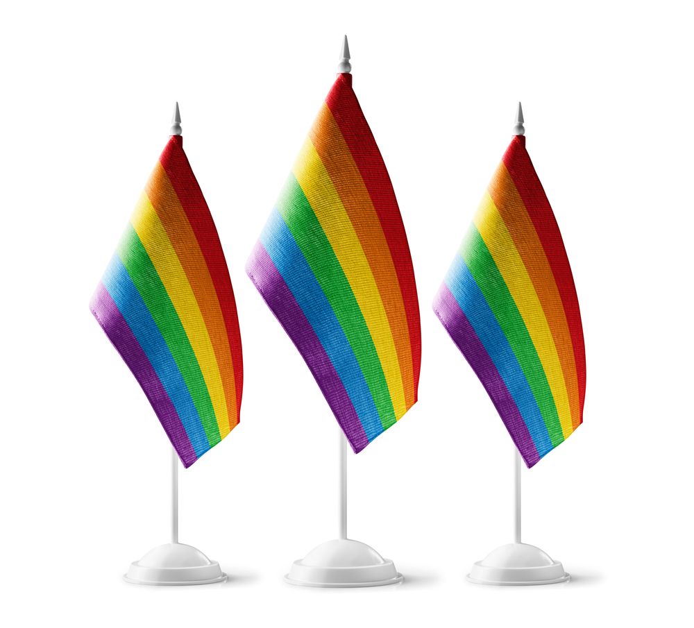 Three Pride flags representing those removed by lifeguard