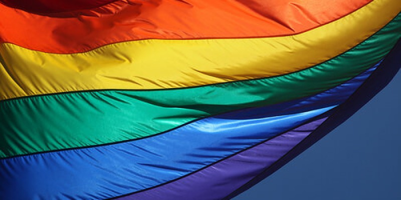 A company recently settled a lawsuit with a former employee who was terminated for wearing t-shirts with anti-LGBTQ+ messaging.