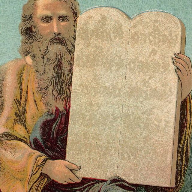 Moses holding the Ten Commandments.