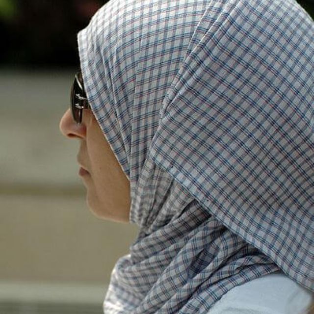 A muslim woman wearing a hijab.