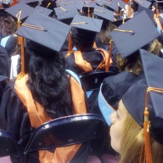 Affirmative action students at a graduation ceremony.
