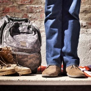 A man was arrested in Georgia after publicly holding a pro-Christian sign to raise awareness about homeless veterans.