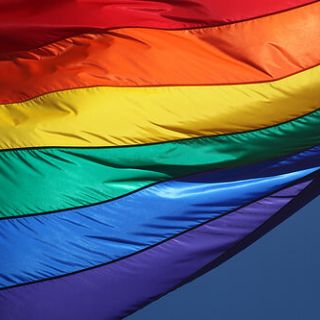A company recently settled a lawsuit with a former employee who was terminated for wearing t-shirts with anti-LGBTQ+ messaging.
